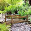 Outsunny 7.5' Wooden Garden Bridge with Planters, Stained Finish Arc Footbridge with Safety Railings for Backyard, Pond Stream, Stained Wood